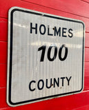 Véritable panneau routier américain OHIO HOLMES 100 COUNTY 46x46cm